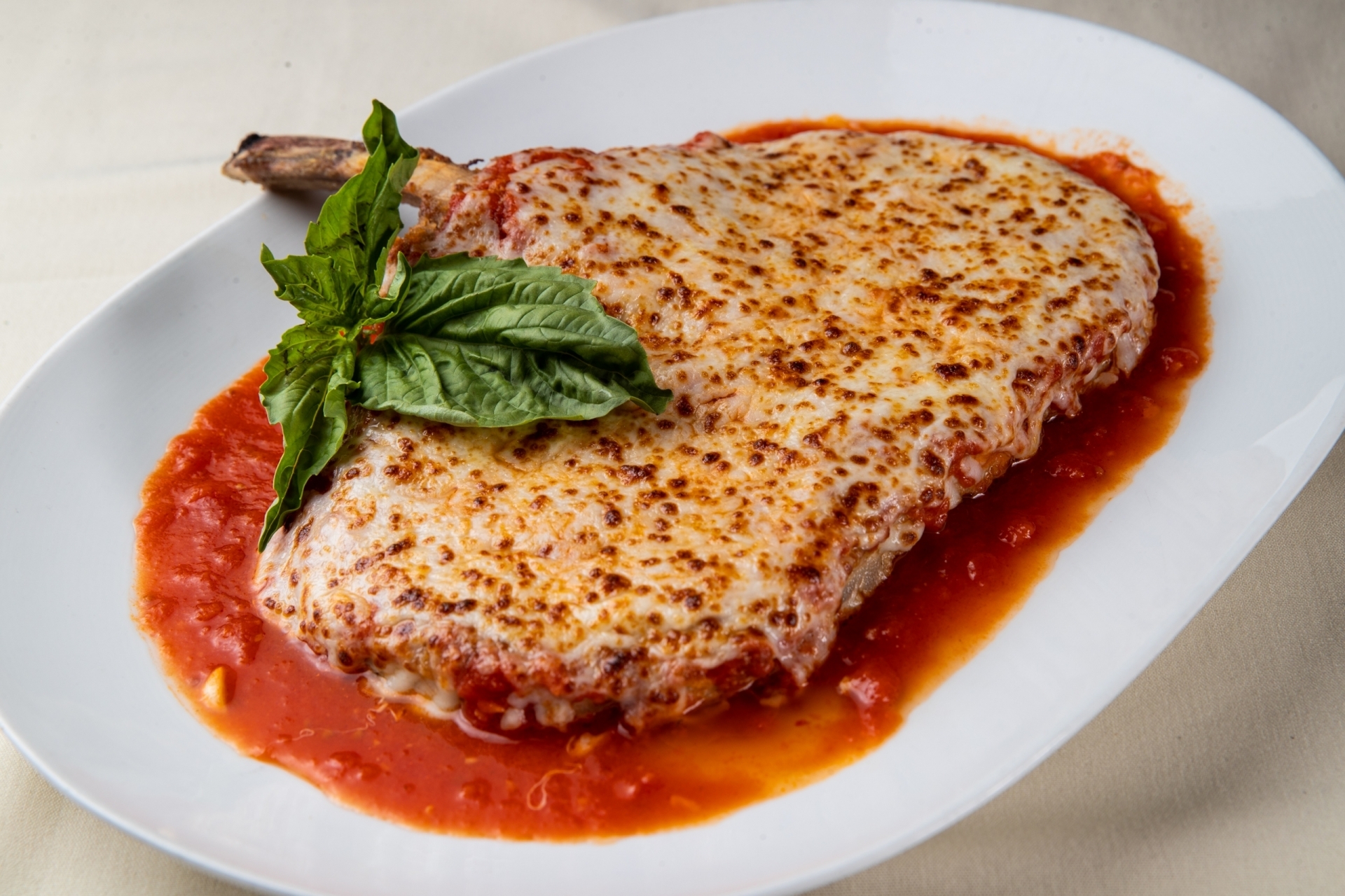 Piero's Italian Cuisine's Classic Veal Chop Parmesan