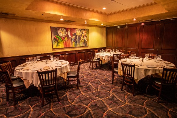 piero's italian cuisine is social distancing due to covid-19 in dining room