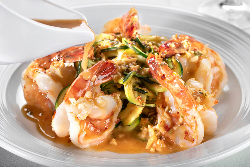 65fc8058da24ef328824d5ea_Piero's Jumbo Shrimp Scampi Sauce Pour, credit Chris Wessling